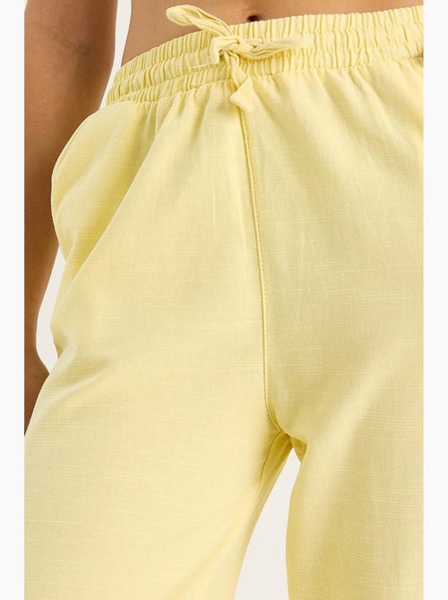 Pantalon palazzo en lin avec taille élastique et poches bianco lucci - Kiabi Pantalon palazzo en lin avec taille élastique et poches bianco lucci - Kiabi