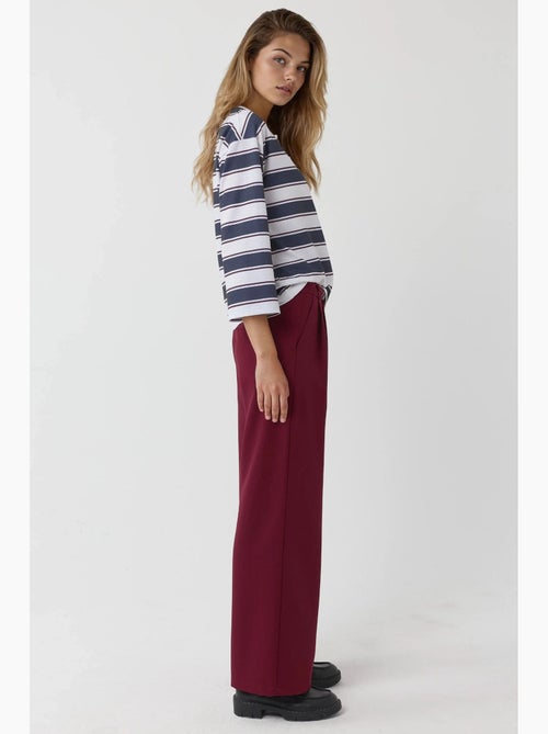 Pantalon palazzo plissé taille haute hiccup - Kiabi Pantalon palazzo plissé taille haute hiccup - Kiabi