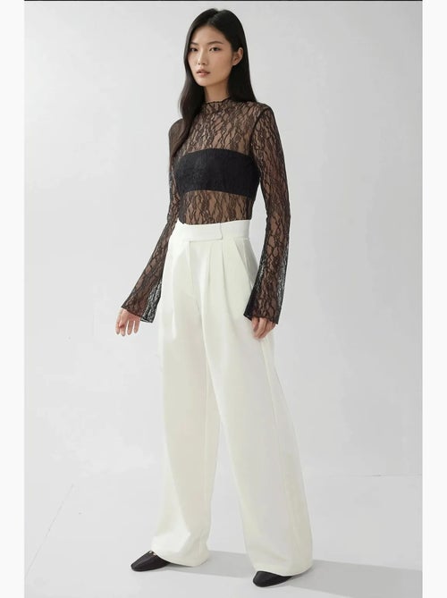 Pantalon palazzo taille haute à jambes larges hiccup - Kiabi Pantalon palazzo taille haute à jambes larges hiccup - Kiabi
