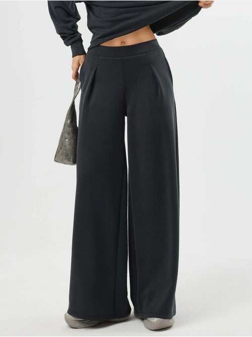 Pantalon palazzo taille haute avec élastique busem - Kiabi Pantalon palazzo taille haute avec élastique busem - Kiabi