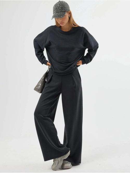Pantalon palazzo taille haute avec élastique busem - Kiabi Pantalon palazzo taille haute avec élastique busem - Kiabi