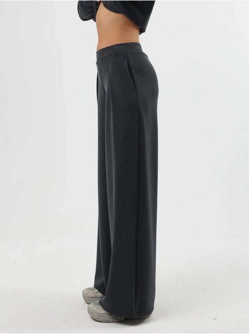 Pantalon palazzo taille haute avec élastique busem - Kiabi Pantalon palazzo taille haute avec élastique busem - Kiabi