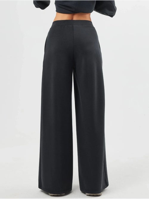 Pantalon palazzo taille haute avec élastique busem - Kiabi Pantalon palazzo taille haute avec élastique busem - Kiabi