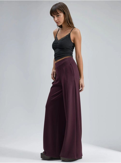 Pantalon palazzo taille haute avec élastique busem - Kiabi Pantalon palazzo taille haute avec élastique busem - Kiabi