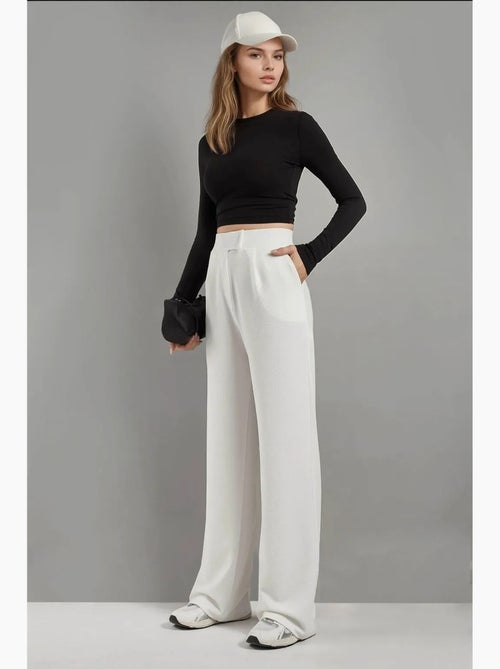 Pantalon palazzo taille haute en crêpe élastique hiccup - Kiabi Pantalon palazzo taille haute en crêpe élastique hiccup - Kiabi