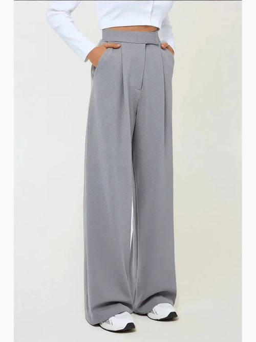 Pantalon palazzo taille haute en crêpe élastique hiccup - Kiabi Pantalon palazzo taille haute en crêpe élastique hiccup - Kiabi