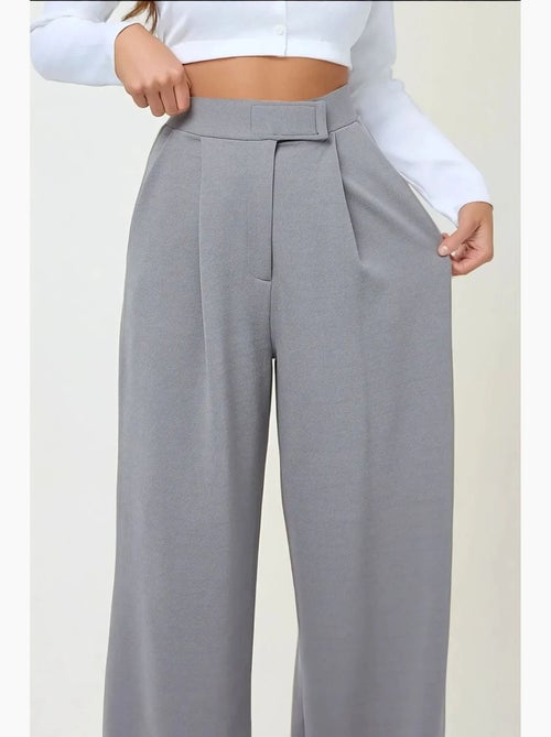 Pantalon palazzo taille haute en crêpe élastique hiccup - Kiabi Pantalon palazzo taille haute en crêpe élastique hiccup - Kiabi