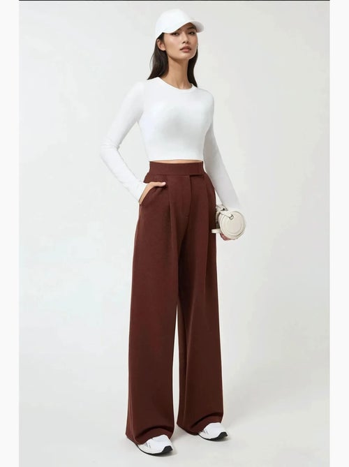 Pantalon palazzo taille haute en crêpe élastique hiccup - Kiabi Pantalon palazzo taille haute en crêpe élastique hiccup - Kiabi