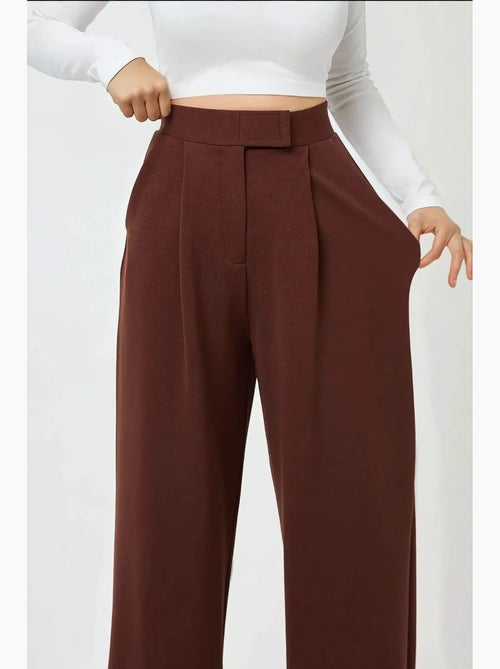 Pantalon palazzo taille haute en crêpe élastique hiccup - Kiabi Pantalon palazzo taille haute en crêpe élastique hiccup - Kiabi