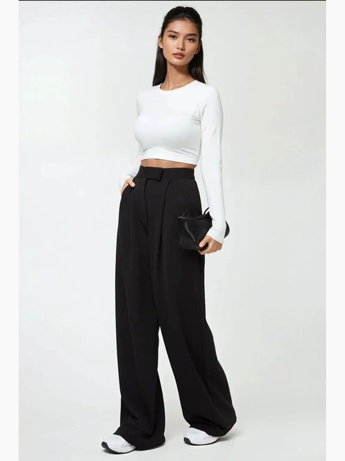 Pantalon palazzo taille haute en crêpe élastique hiccup - Kiabi Pantalon palazzo taille haute en crêpe élastique hiccup - Kiabi