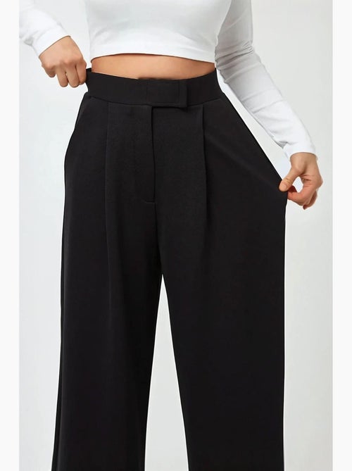 Pantalon palazzo taille haute en crêpe élastique hiccup - Kiabi Pantalon palazzo taille haute en crêpe élastique hiccup - Kiabi