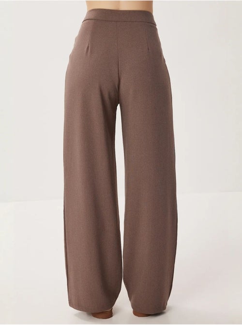 Pantalon palazzo taille haute et jambes larges avec ceinture istanbul - Kiabi Pantalon palazzo taille haute et jambes larges avec ceinture istanbul - Kiabi