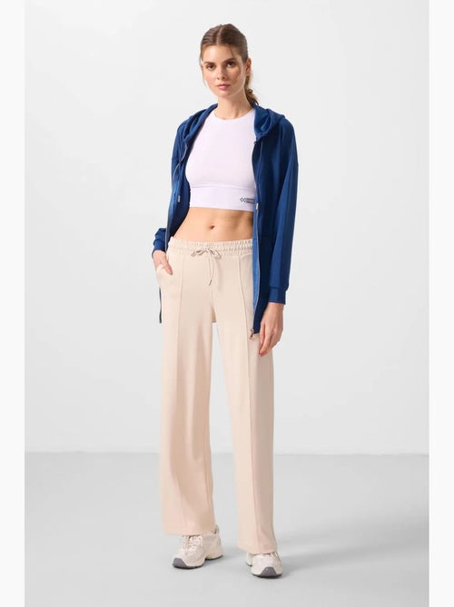 Pantalon palazzo texturé à jambes larges avec cordon de serrage à la taille tommy - Kiabi Pantalon palazzo texturé à jambes larges avec cordon de serrage à la taille tommy - Kiabi