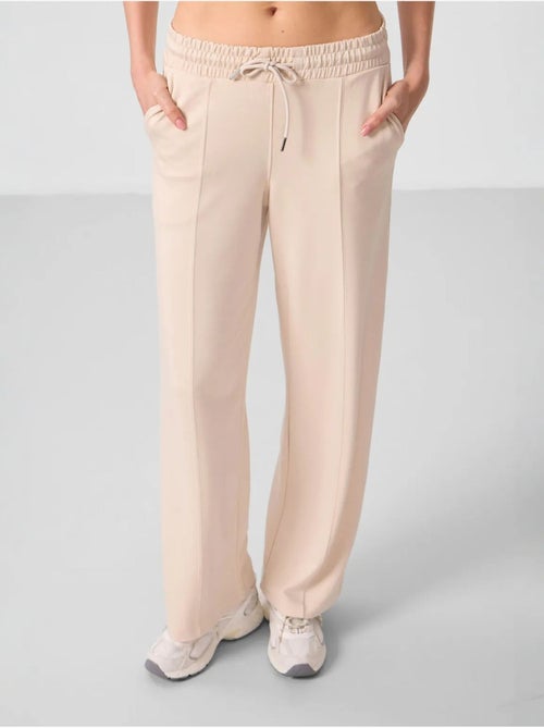 Pantalon palazzo texturé à jambes larges avec cordon de serrage à la taille tommy - Kiabi Pantalon palazzo texturé à jambes larges avec cordon de serrage à la taille tommy - Kiabi