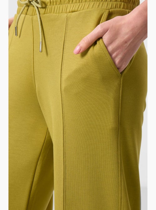 Pantalon palazzo texturé à jambes larges avec cordon de serrage à la taille tommy - Kiabi Pantalon palazzo texturé à jambes larges avec cordon de serrage à la taille tommy - Kiabi