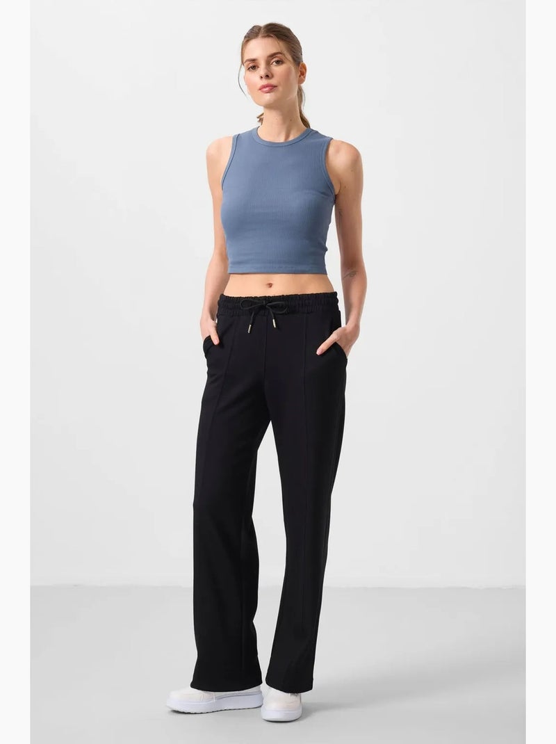 Pantalon palazzo texturé à jambes larges avec cordon de serrage à la taille tommy Noir - Kiabi