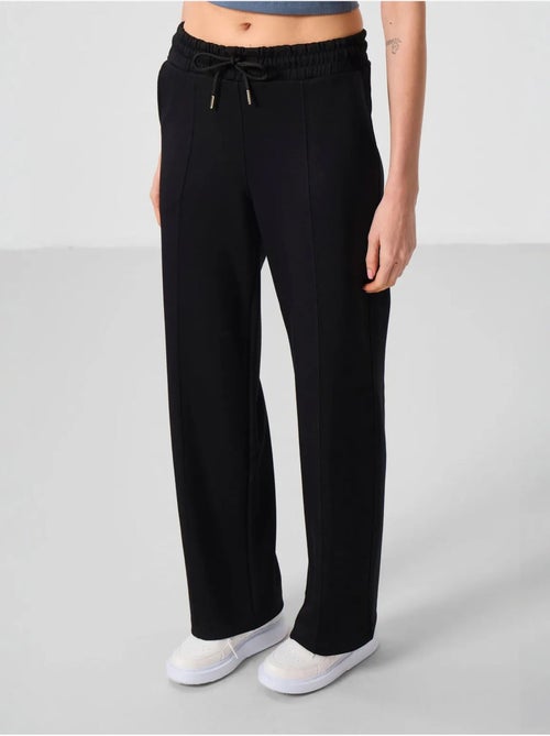 Pantalon palazzo texturé à jambes larges avec cordon de serrage à la taille tommy - Kiabi Pantalon palazzo texturé à jambes larges avec cordon de serrage à la taille tommy - Kiabi