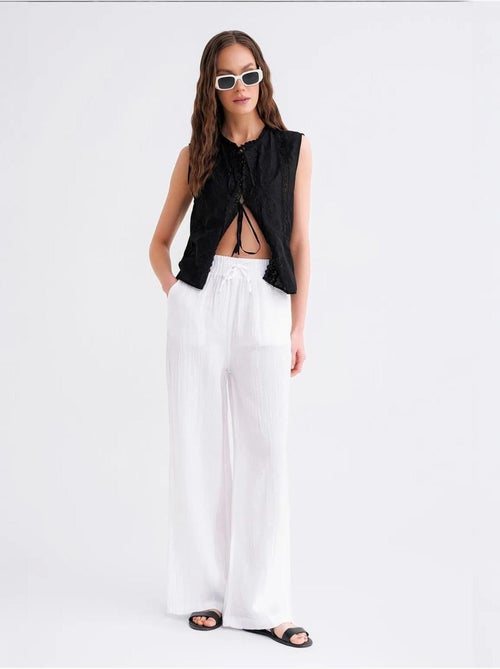 Pantalon palazzo texturé taille haute mixray - Kiabi Pantalon palazzo texturé taille haute mixray - Kiabi