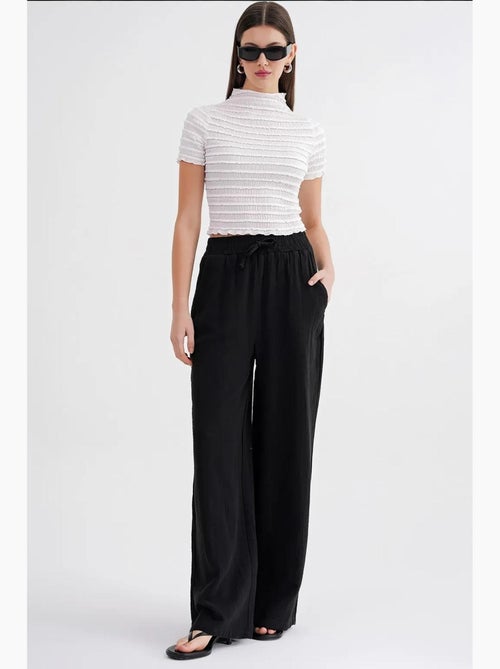 Pantalon palazzo texturé taille haute mixray - Kiabi Pantalon palazzo texturé taille haute mixray - Kiabi