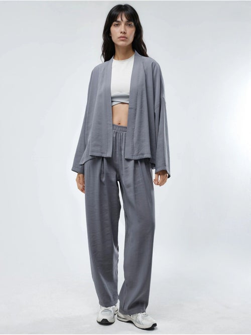 Pantalon plissé à jambes larges busem - Kiabi Pantalon plissé à jambes larges busem - Kiabi