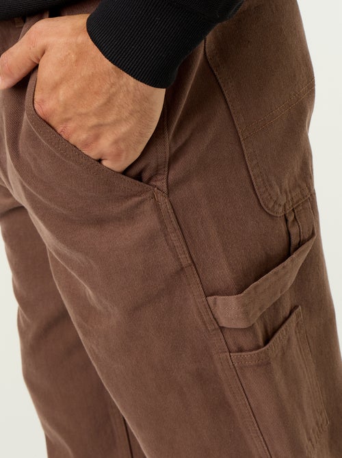 Pantalon style carpenter en denim - Kiabi Pantalon style carpenter en denim - Kiabi
