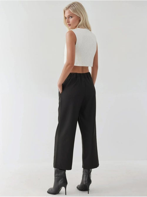 Pantalon taille haute à boutons - Kiabi Pantalon taille haute à boutons - Kiabi