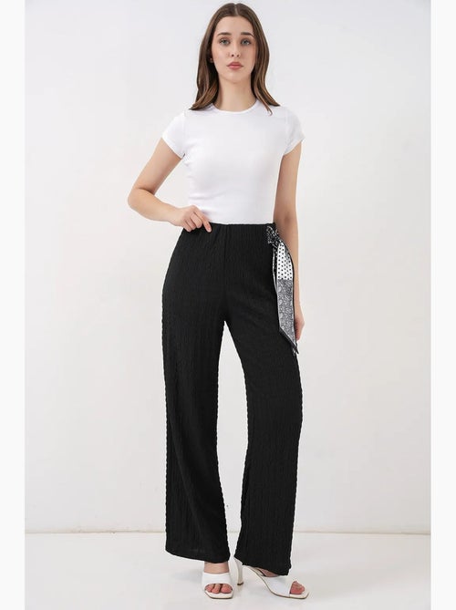 Pantalon taille haute à jambes larges avec détail de nœud bdart - Kiabi Pantalon taille haute à jambes larges avec détail de nœud bdart - Kiabi