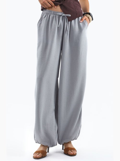 Pantalon tissé à jambe large avec taille à cordon de serrage busem - Kiabi