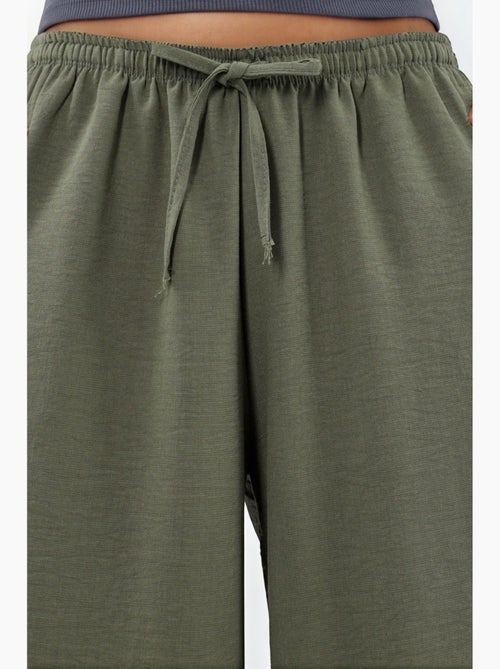 Pantalon tissé à jambe large avec taille à cordon de serrage busem - Kiabi