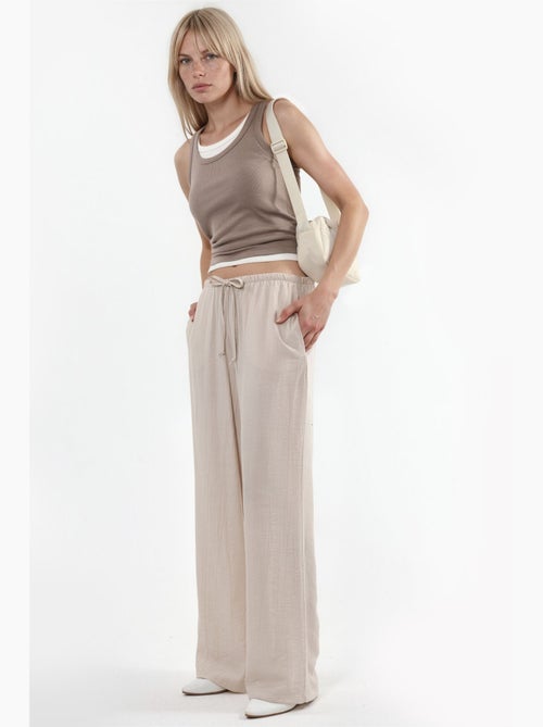 Pantalon tissé à jambe large pour femme busem - Kiabi Pantalon tissé à jambe large pour femme busem - Kiabi