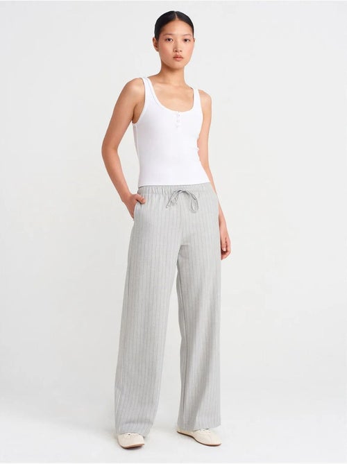 Pantalon tissé rayé à jambe large dilvin - Kiabi Pantalon tissé rayé à jambe large dilvin - Kiabi