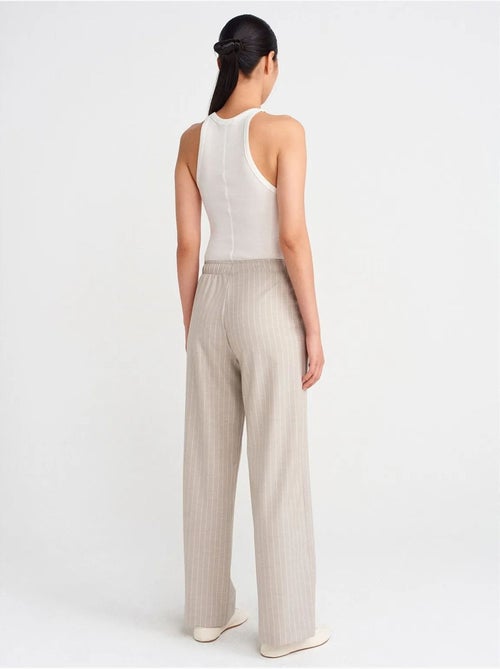 Pantalon tissé rayé à jambe large dilvin - Kiabi Pantalon tissé rayé à jambe large dilvin - Kiabi