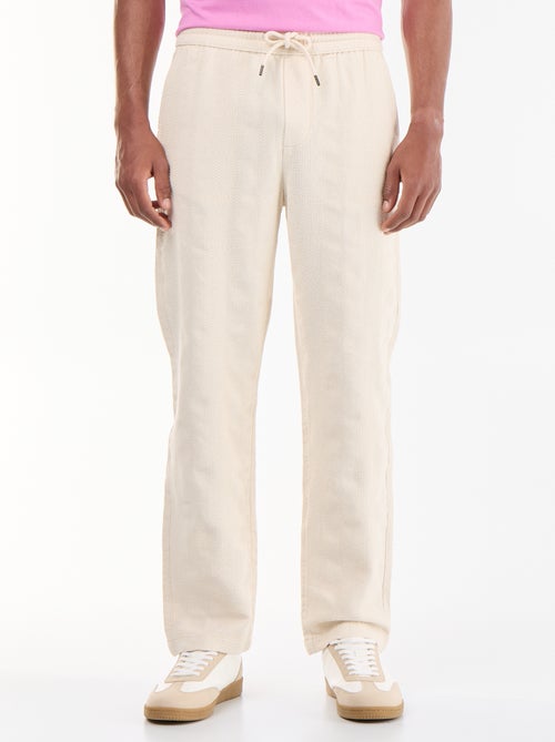 Pantalon uni en matière texturée - Kiabi