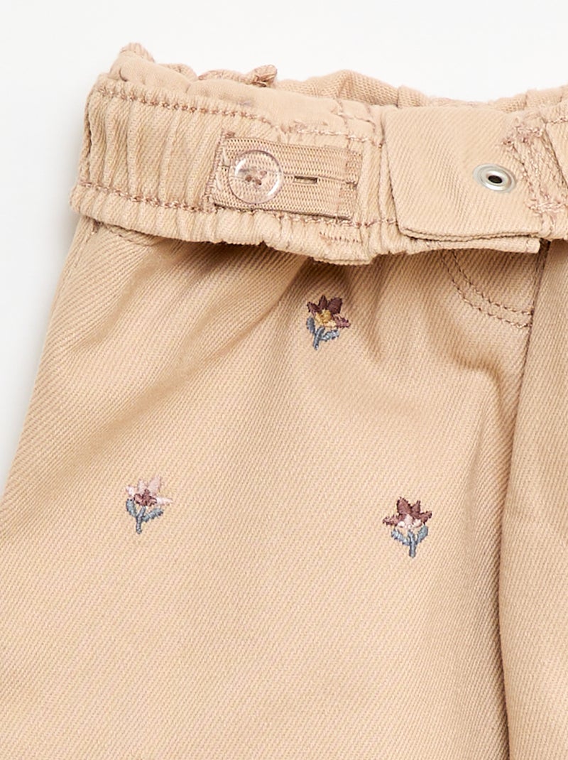 Paperbag broek met 'bloemen' borduursel Biege - Kiabi