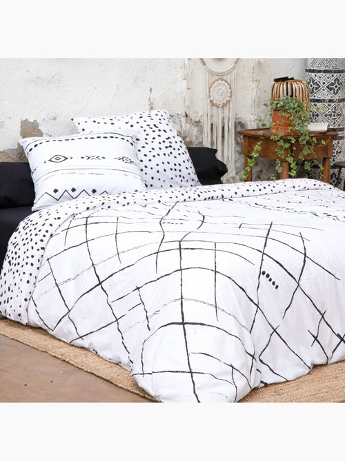 Parure de lit ikat – + 2 taies d'oreiller en coton 57 fils - Kiabi Parure de lit ikat – + 2 taies d'oreiller en coton 57 fils - Kiabi