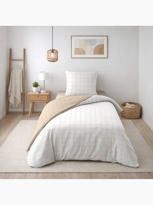 Parure de lit réversible – carreaux chic – 100% coton 57 fils – 2 taies 63x63 cm - Kiabi Parure de lit réversible – carreaux chic – 100% coton 57 fils – 2 taies 63x63 cm - Kiabi