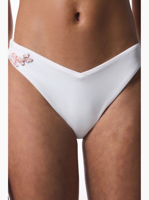 Pearl bikinibroekje met v-hals en kralen penti - Kiabi Pearl bikinibroekje met v-hals en kralen penti - Kiabi