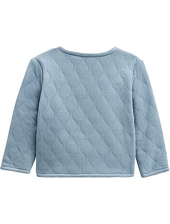 Petite Balade babyoutfit: gewatteerd katoenen jasje en fluwelen broekje