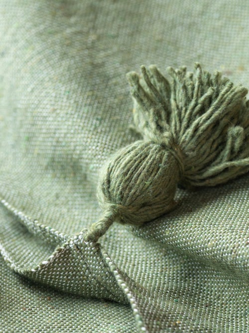 Plaid ou jeté de lit laine à pompons - Kiabi Plaid ou jeté de lit laine à pompons - Kiabi