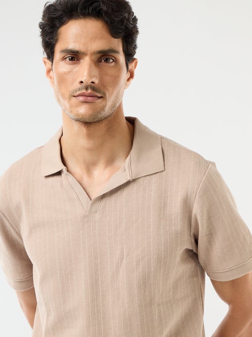 Polo à manches courtes et matière en nid d'abeilles - Kiabi Polo à manches courtes et matière en nid d'abeilles - Kiabi