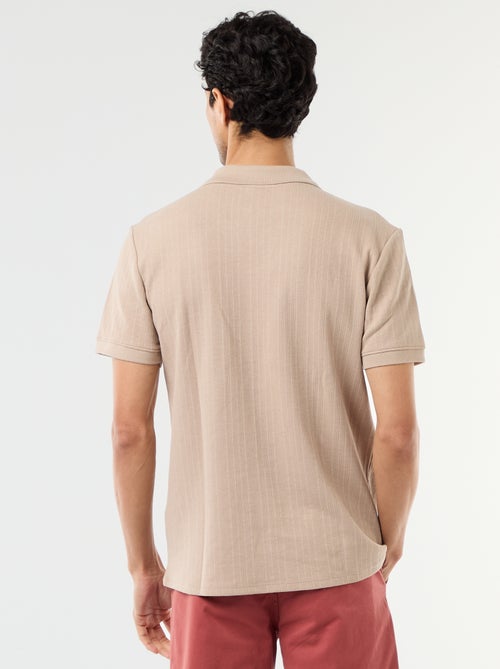 Polo à manches courtes et matière en nid d'abeilles - Kiabi Polo à manches courtes et matière en nid d'abeilles - Kiabi