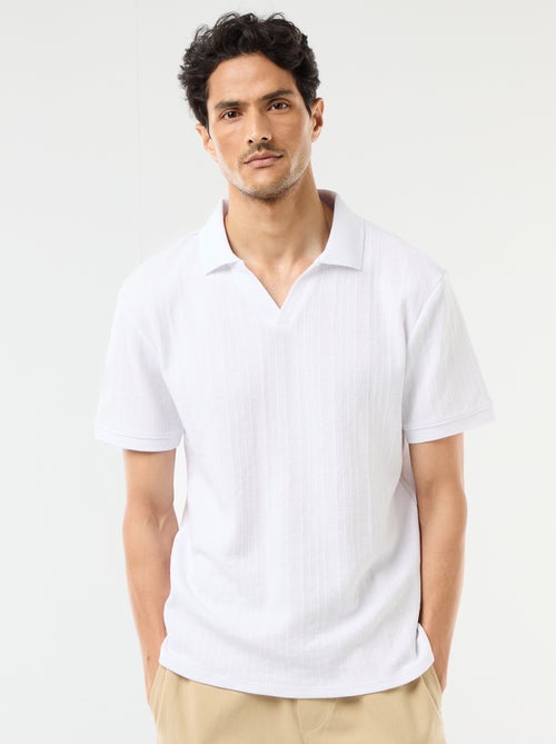 Polo à manches courtes et matière en nid d'abeilles - Kiabi Polo à manches courtes et matière en nid d'abeilles - Kiabi