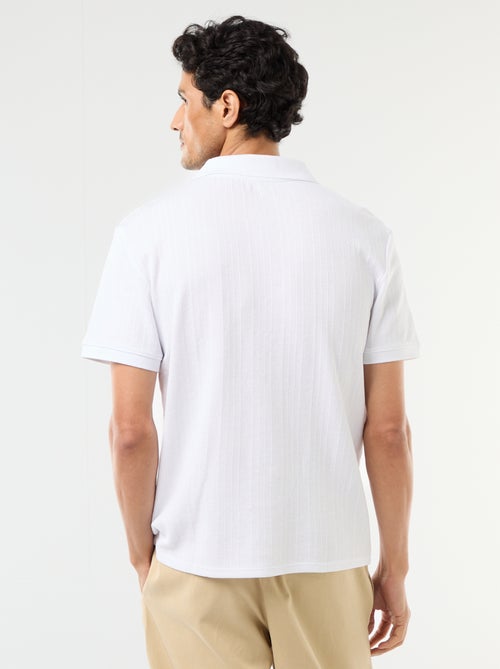 Polo à manches courtes et matière en nid d'abeilles - Kiabi Polo à manches courtes et matière en nid d'abeilles - Kiabi