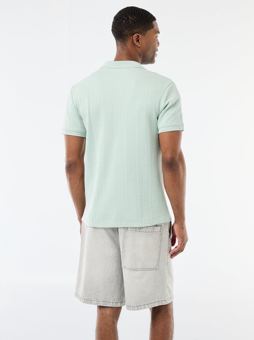 Polo à manches courtes et matière en nid d'abeilles - Kiabi Polo à manches courtes et matière en nid d'abeilles - Kiabi