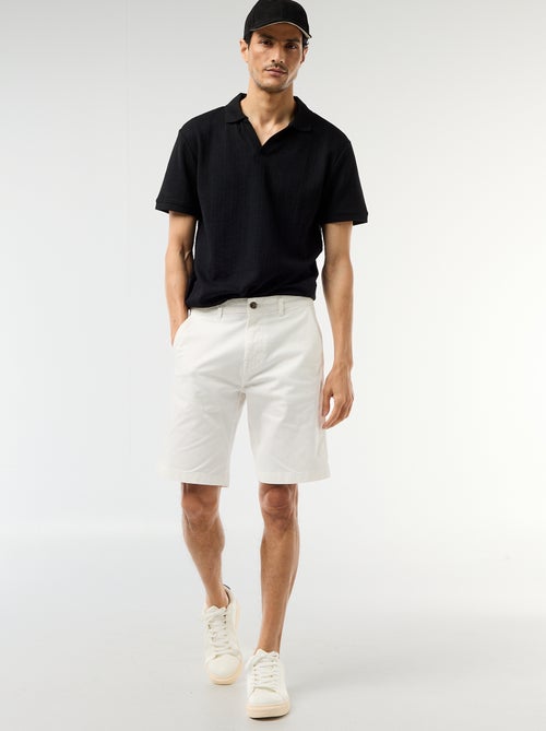 Polo à manches courtes et matière en nid d'abeilles - Kiabi Polo à manches courtes et matière en nid d'abeilles - Kiabi