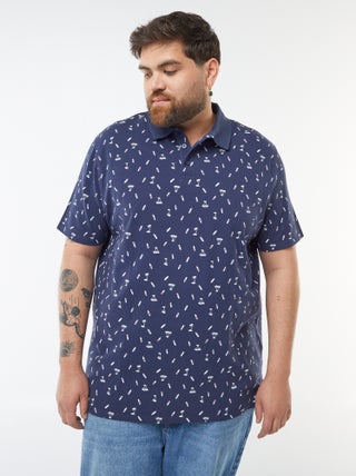 Polo à motifs en maille piquée