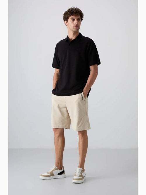 Polo ample tommy - Kiabi Polo ample tommy - Kiabi