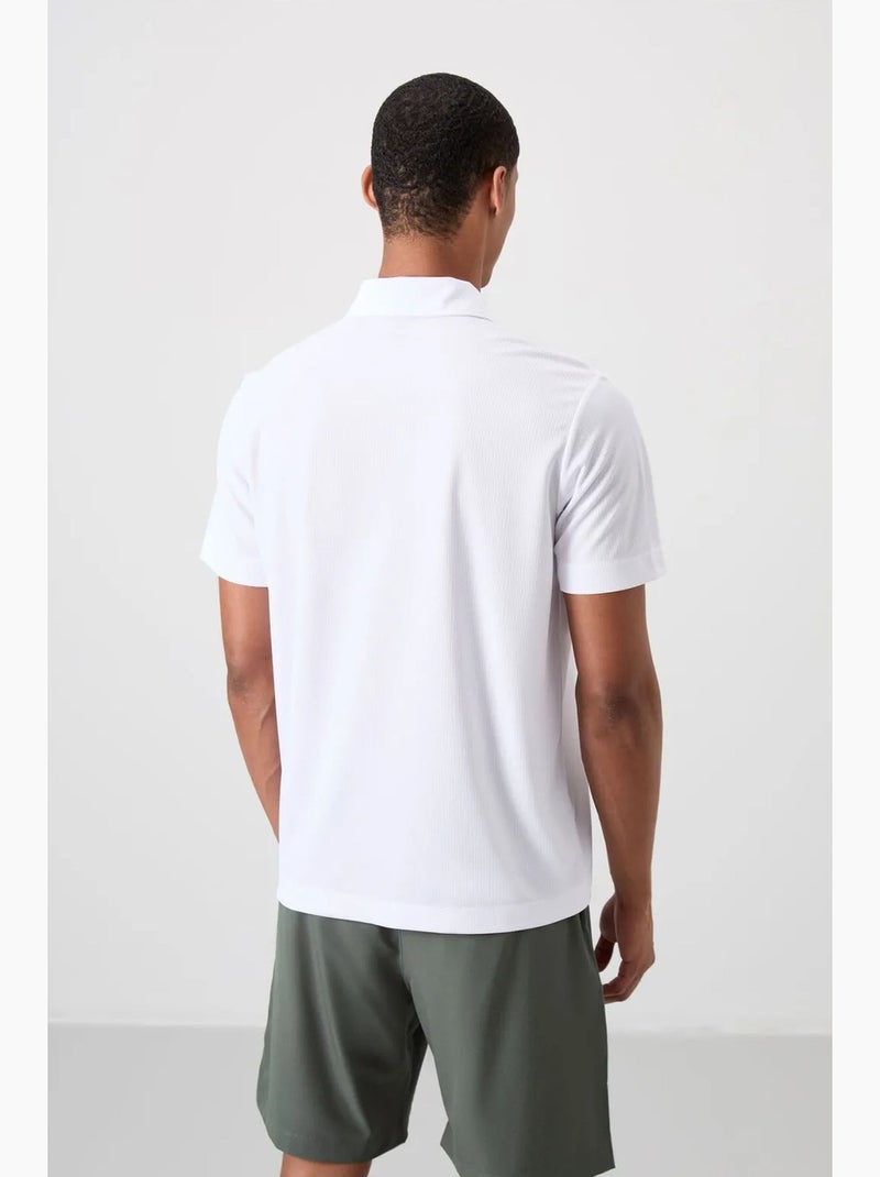 Polo boutonné tommy Blanc - Kiabi
