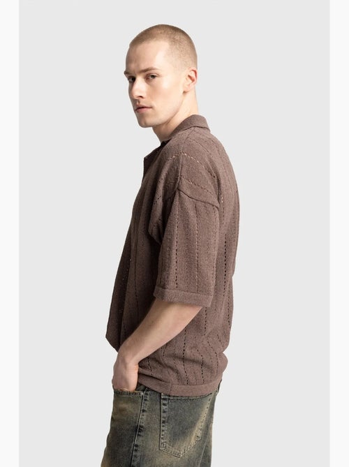 Polo coton texturé ample giesto - Kiabi Polo coton texturé ample giesto - Kiabi