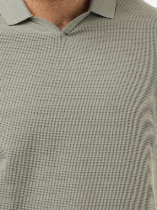 Polo en coton stretch à manches courtes - Kiabi